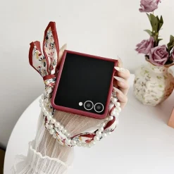 Wigento Für Samsung Galaxy Z Flip7 5G Blumen Hülle Halstuch und Perlenkette Sale