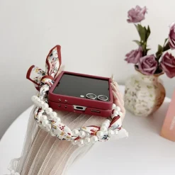 Wigento Für Samsung Galaxy Z Flip7 5G Blumen Hülle Halstuch und Perlenkette Sale